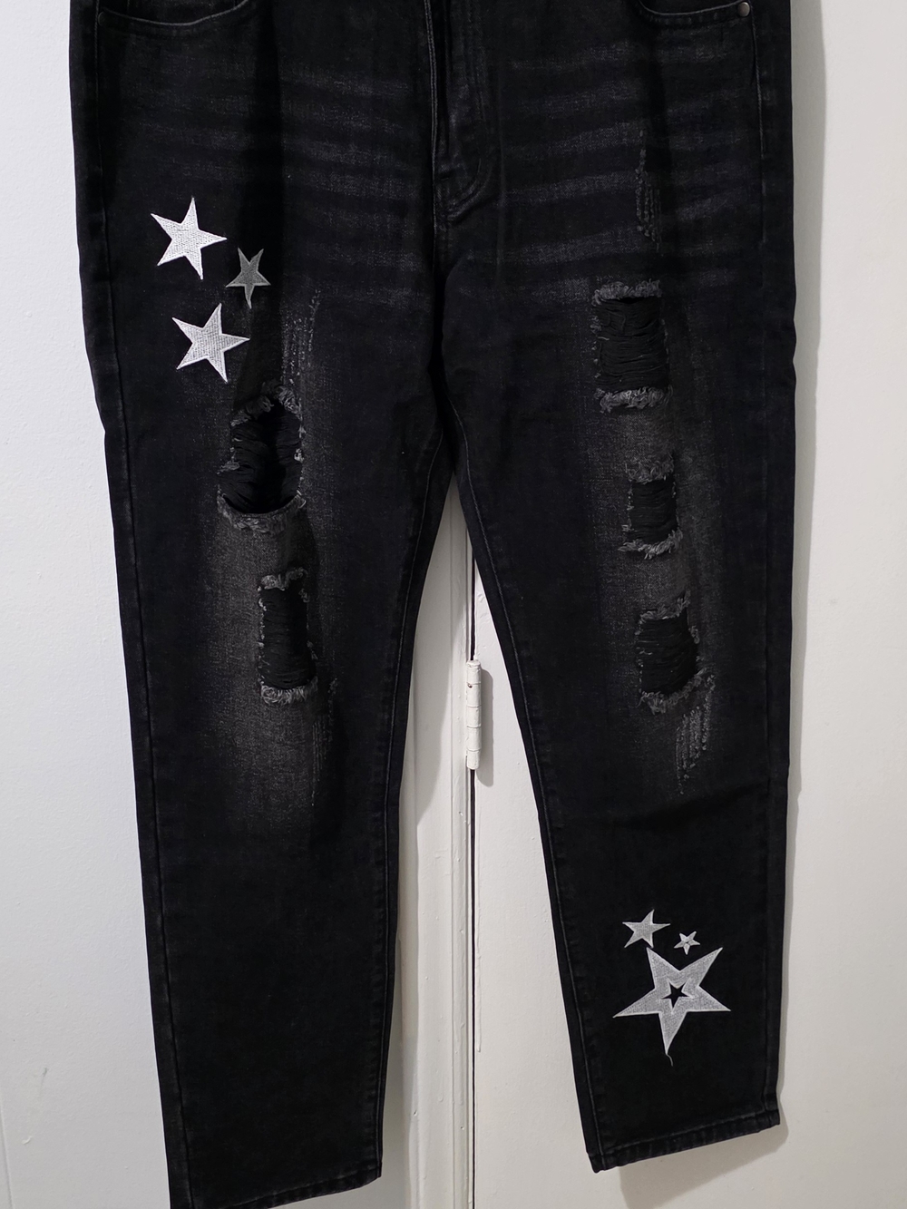 Black Distressed Jeans with Silver Star Accents